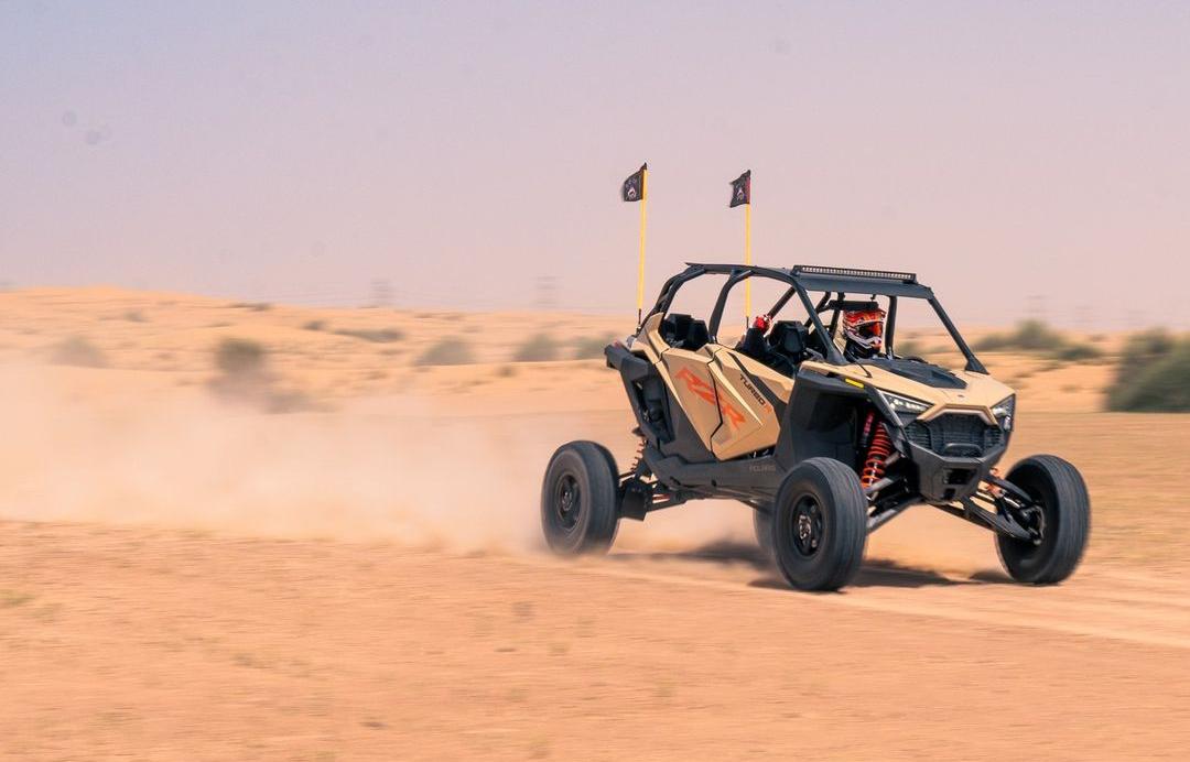 Image of Buggy Speeding through the Desert.